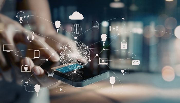 Futuristic scene with a smartphone connected to digital icons